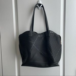 black eyelet faux leather bag